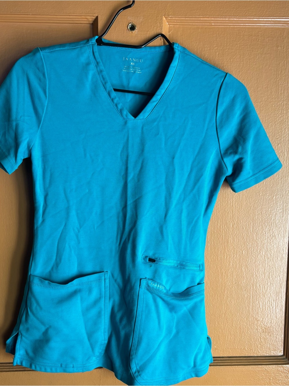 Jaanuu Teal stretch V-Neck fitted Scrub Top with zippered pocket XS